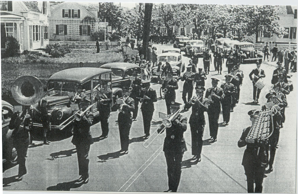 Early photo at Atwood Museum of parade through Chatham